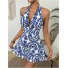 imageMilumia Womens Boho Floral Print Backless Halter Neck Sleeveless Ruffle Hem RompersBlue