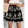 imageMilumia Womens Ditsy Floral Elastic Waist Skort Ruffle Hem Boho Short Skirt SkortsBlack and Beige