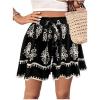 imageMilumia Womens Ditsy Floral Elastic Waist Skort Ruffle Hem Boho Short Skirt SkortsBlack and Beige