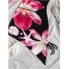 imageMilumia Womens Floral Halter Mini Dress Tie Backless Drawstring Asymmetrical Hem Short DressesBlack